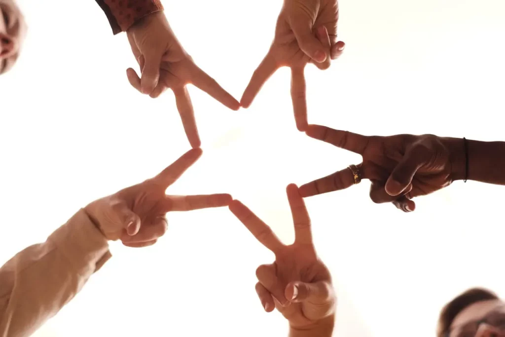 A star of hands showing support given to them from a therapist in the GTA